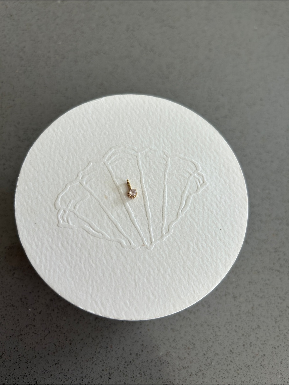 Tiny white sapphire pendant